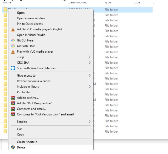 Screenshot of the program files folder in Windows, with Riot Vanguard right-clicked to show the option to Delete the Riot Vanguard folder.